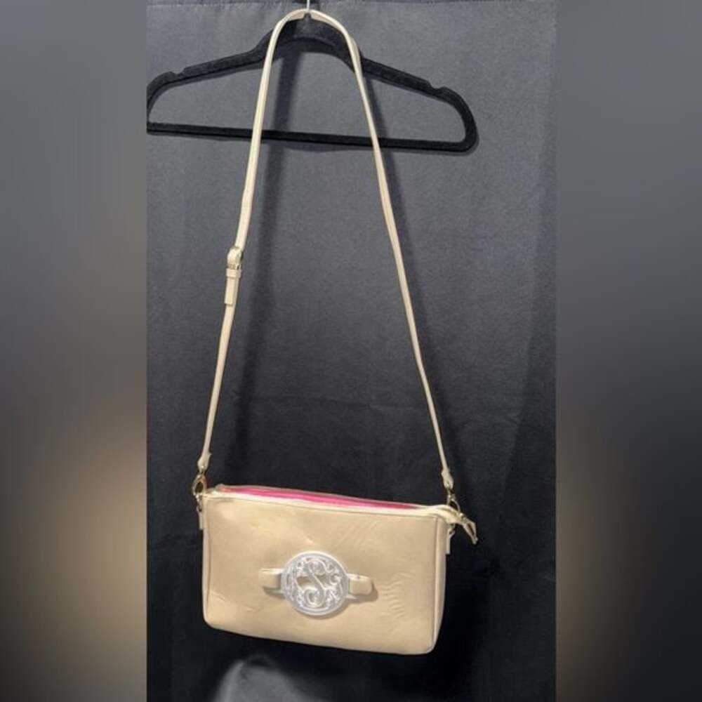 Cream Crossbody Bag with Silver Medallion Accent